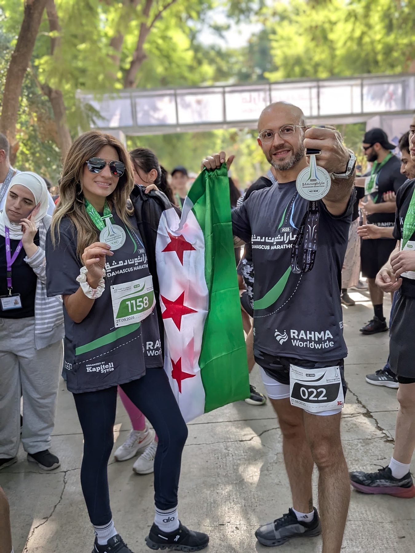 Damascus Marathon finish, 2025 - with the flag